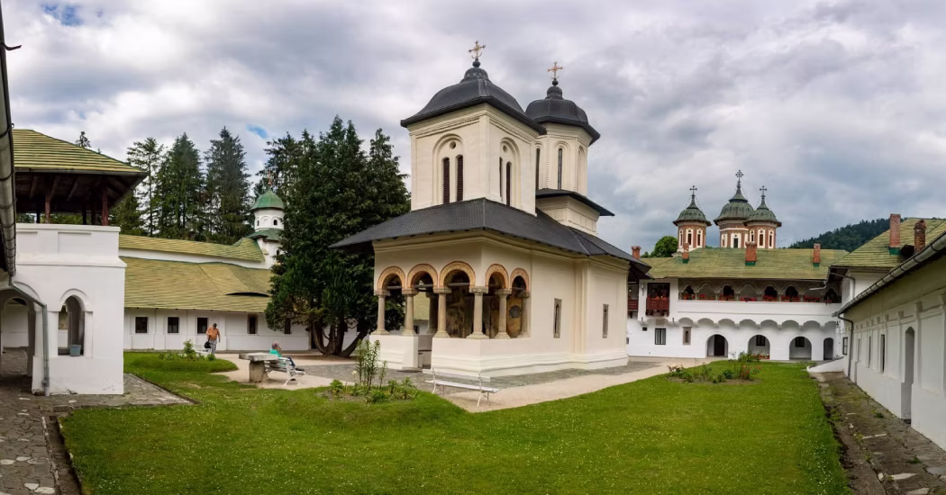 Tourists visit the Sinaia Monastery, a 17th-century Orthodox monastery. 